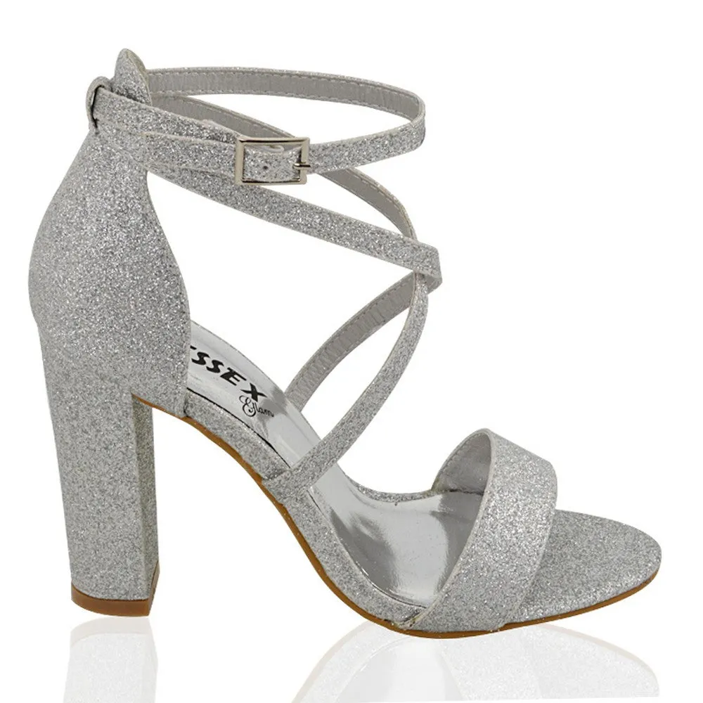 BRIELLA CROSS OVER FRONT STRAPPY BLOCK HIGH HEEL SANDALS IN SILVER GLITTER