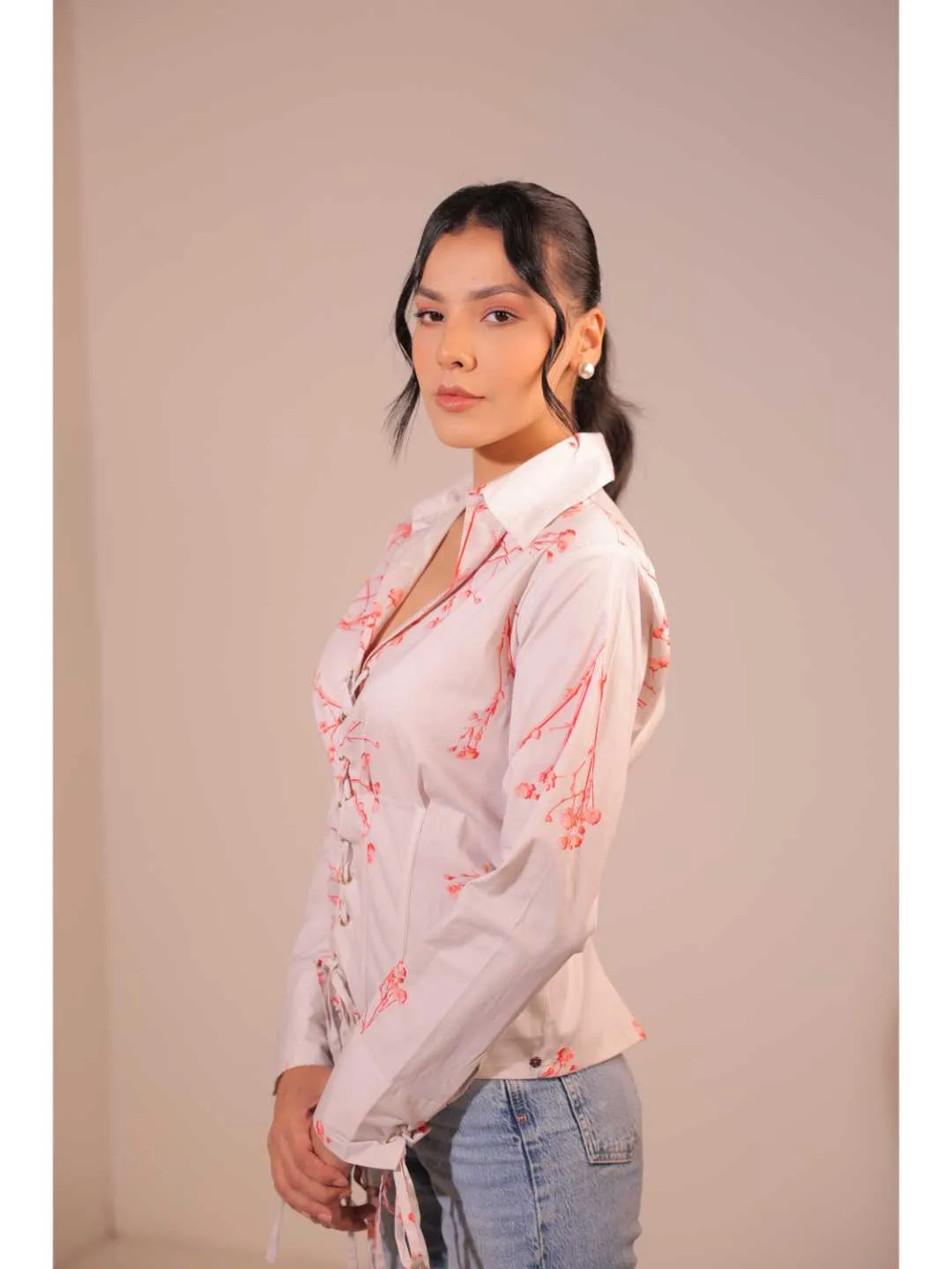 modish cotton lycra floral printed shirt collar corset with front rivets tie-up , full cuff sleeve top . -Off White