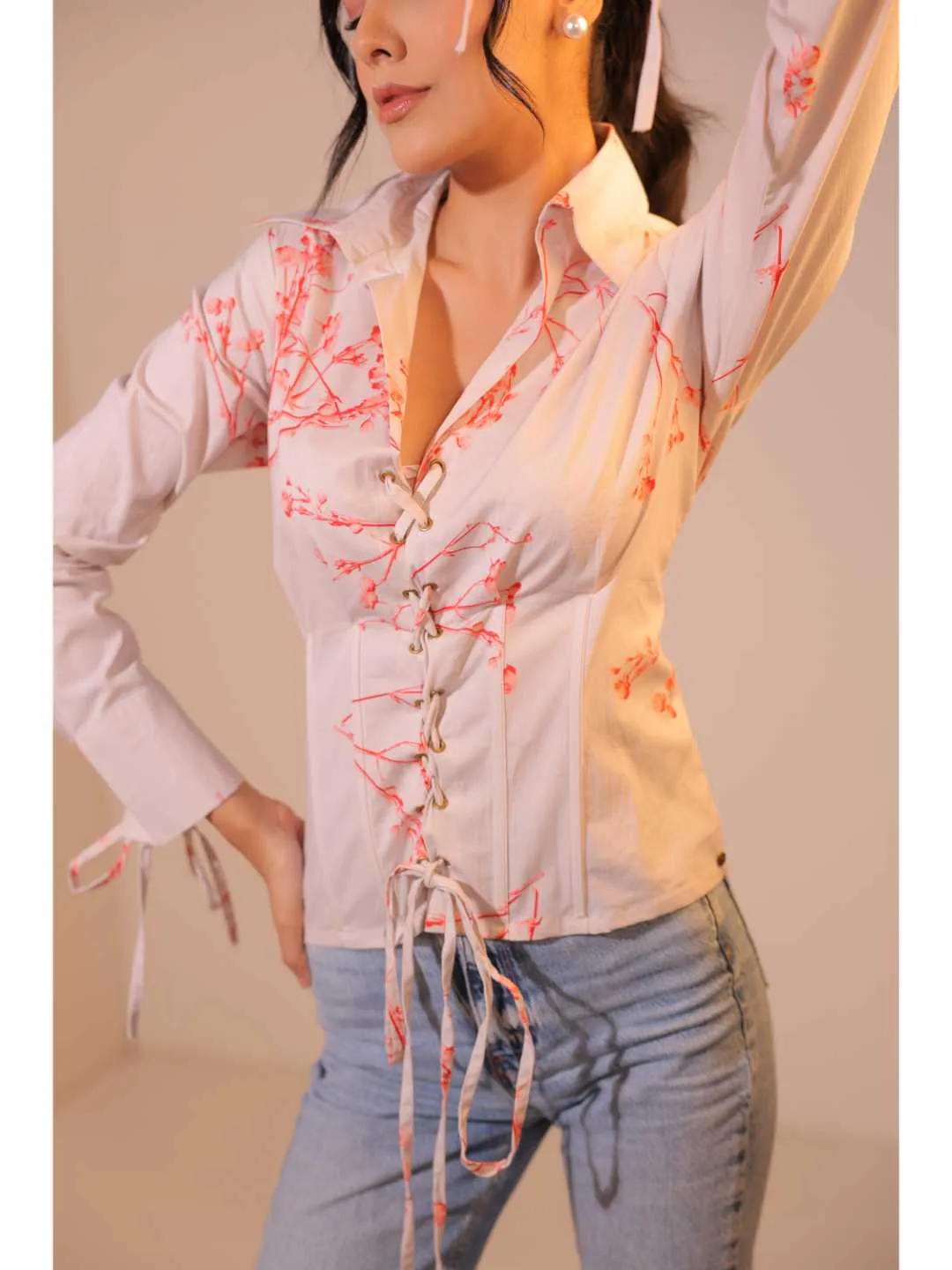 modish cotton lycra floral printed shirt collar corset with front rivets tie-up , full cuff sleeve top . -Off White